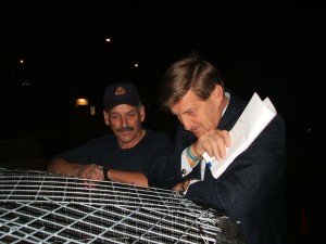 Former Premier Jeff Kennett inspecting a Safe Water Saves Lives Water Tank with the Rotary Club of Ringwood