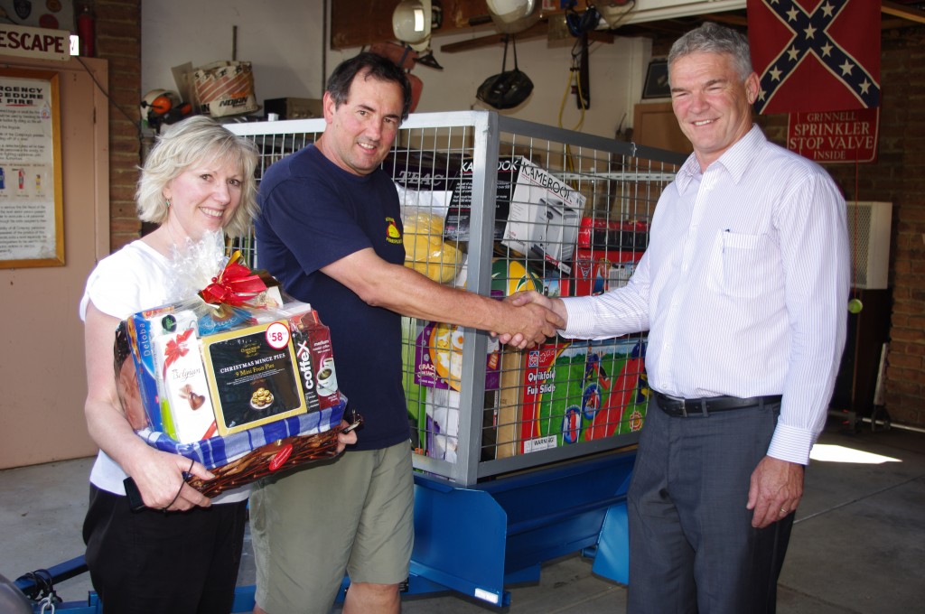 Rotary Club of Ringwood President Tim Treeby with Dan, the winner of the trailer raffle